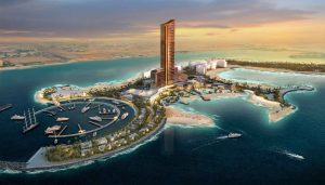 Waterfront resort and marina aerial view at sunset