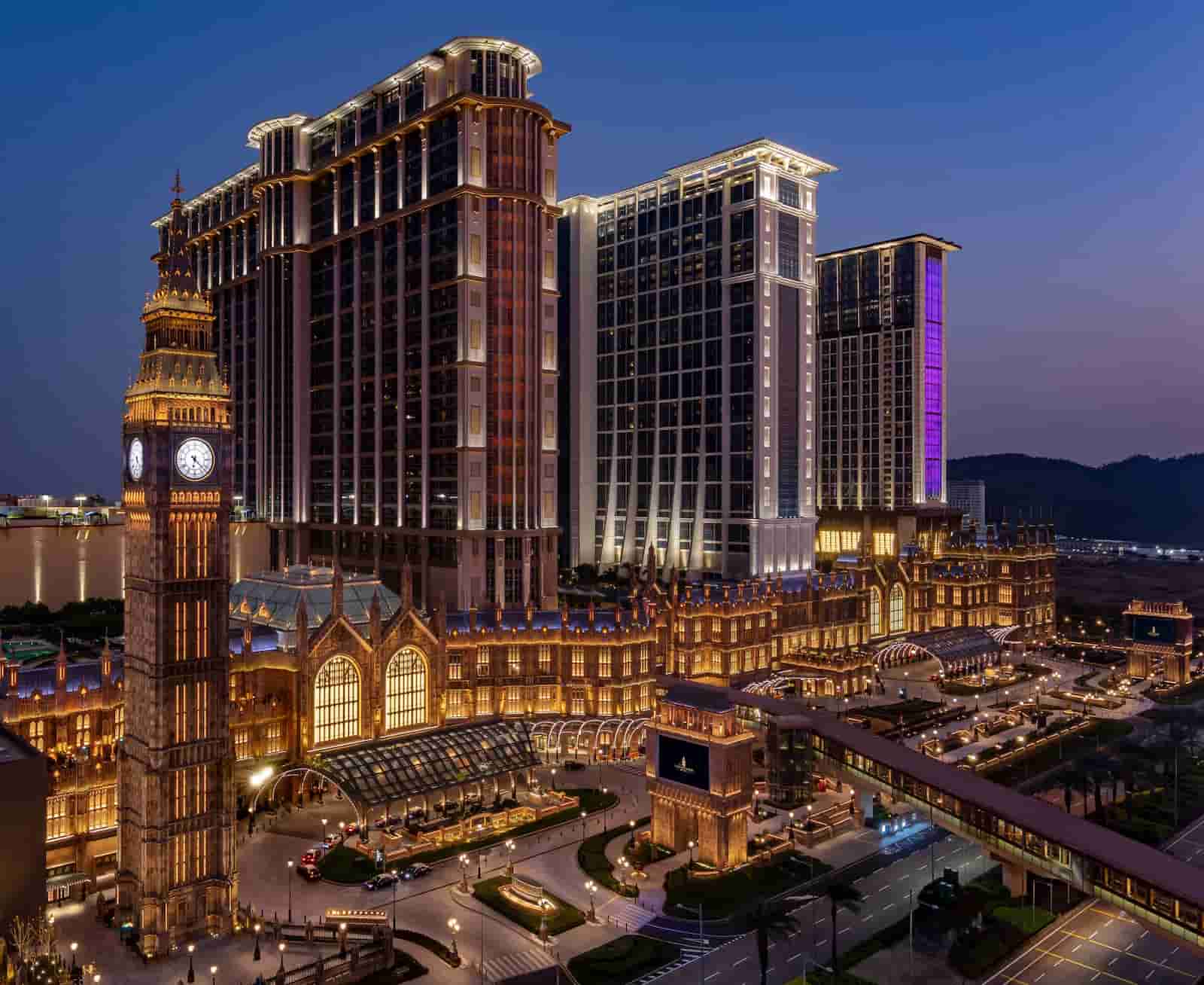 uxury beachfront hotel resort illuminated at night